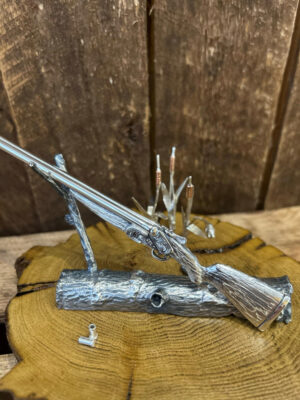 Minature gun with Sterling Silver half tree trunk lying down